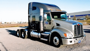 A semi truck is parked, representing short haul trucking jobs that offer driving careers for short haul drivers. The tractor trailer is ready for transportation, highlighting the opportunities for delivering freight and succeeding in the trucking industry.